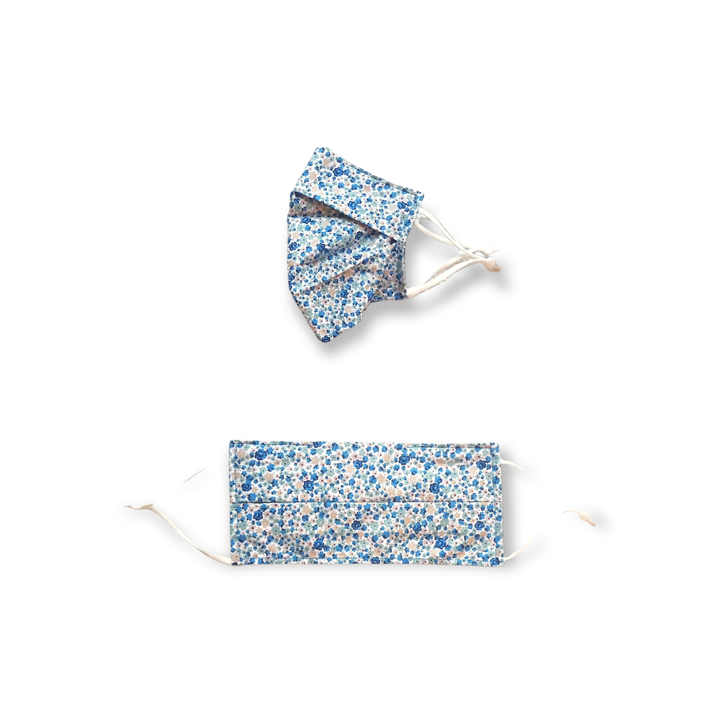 Blue ditsy face mask. Washable and reusable with filter pocket. Adjustable elastic ear loops with toggle adjustment.