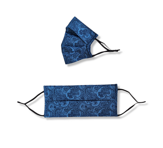Blue, paisley print face mask. Washable and reusable with filter pocket. Adjustable elastic ear loops with toggle adjustment.