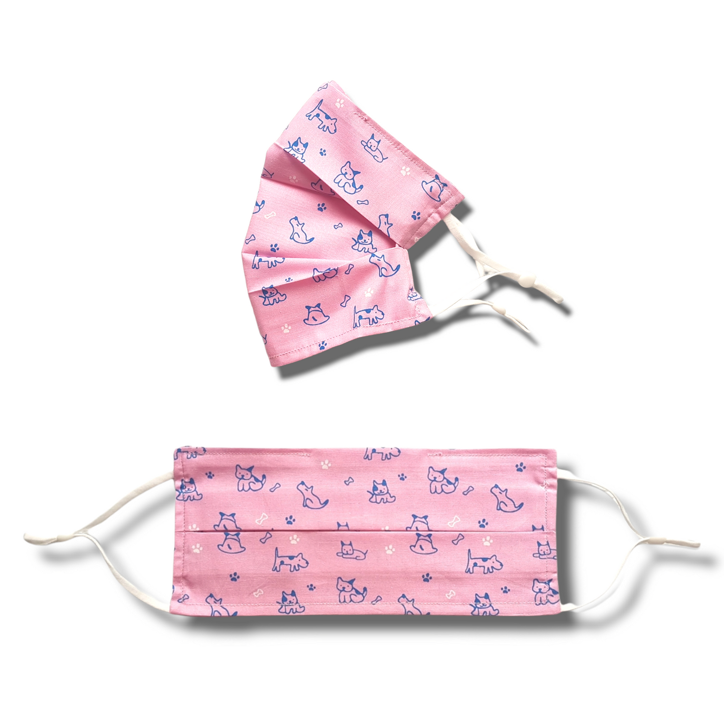 Dog cartoon print face mask. Washable and reusable with filter pocket. Adjustable elastic ear loops with toggle adjustment.