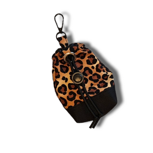 Leopard print dog treat bag with poo bag holder compartment and drawstring opening/closing