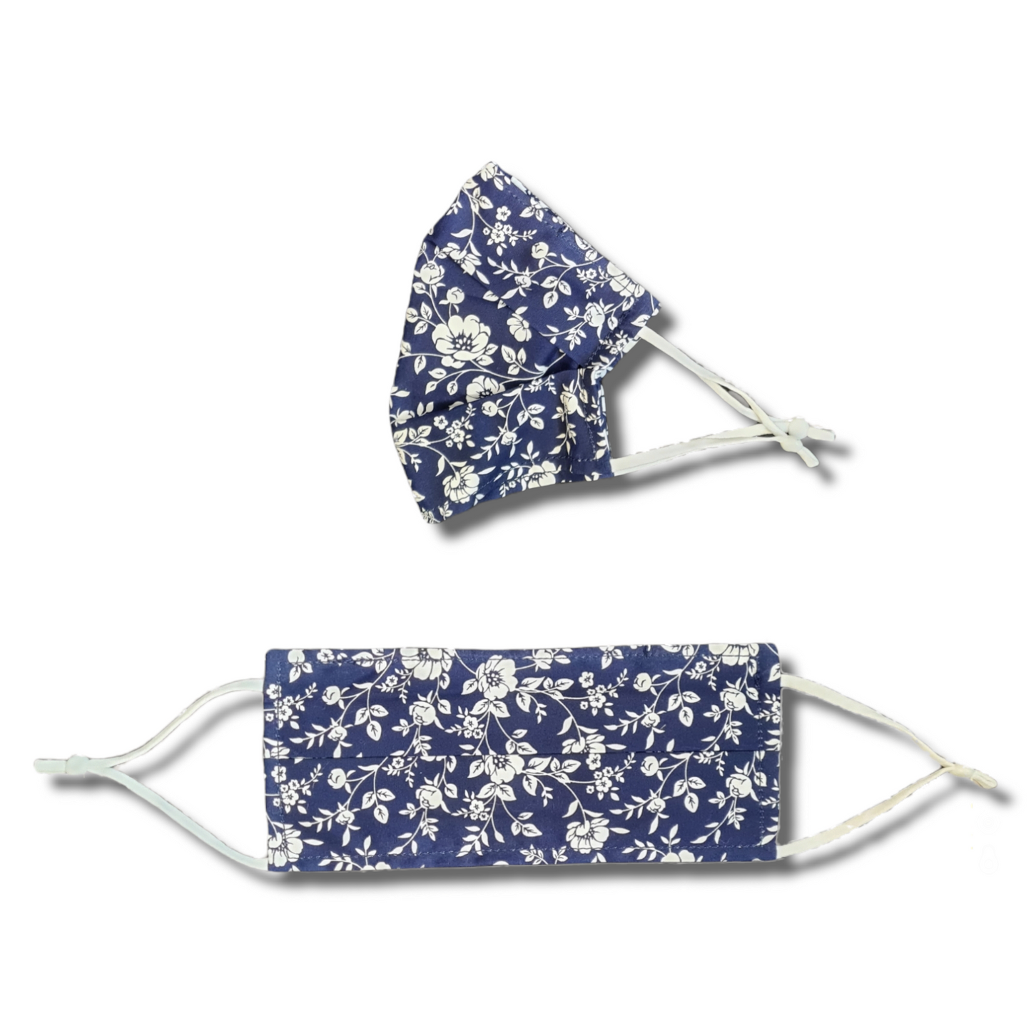 White floral and navy face mask. Washable and reusable with filter pocket. Adjustable elastic ear loops with toggle adjustment.