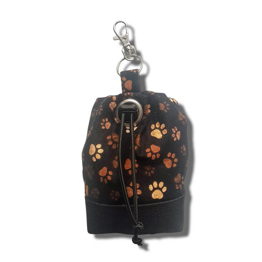 Dog treat bag with poo bag holder compartment